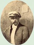 Self-portrait in a white cap…